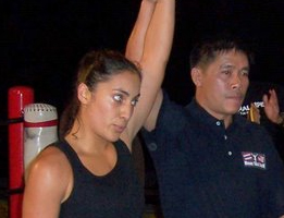 Gina Reyes San Diego Muay Thai Boxer fight winning photo